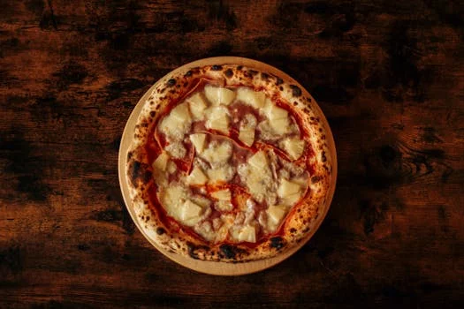 hawaiian pizza with pineapple ham cheese